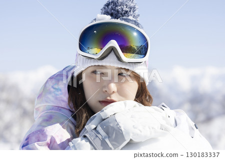 Cute woman enjoying the snow 130183337