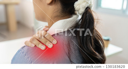 Office Syndrome Woman Experiencing Shoulder Pain at Work 130183620