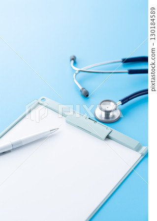 Blue stethoscope and binder Blue stethoscope and binder 130184589