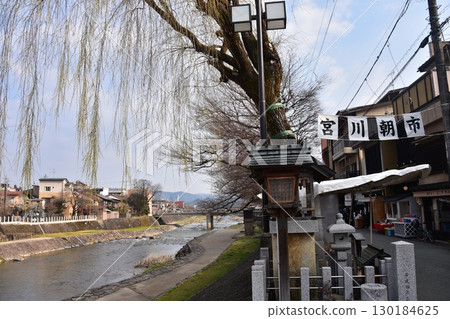 Takayama City, Gifu Prefecture, Japan: Miyagawa River flows through the center of the city, and the tourist attraction Miyagawa Morning Market features street stalls selling local specialties and a shopping street 130184625