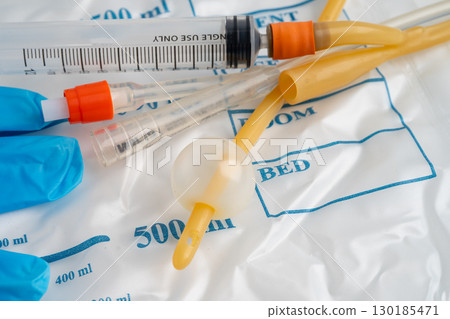Foley catheter and urine drainage bag collect urine for disability or patient in hospital. 130185471