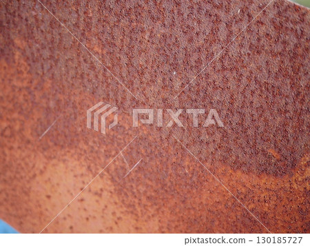 Rusty iron plate - filled with the essence of wabi-sabi - A wonderful way to mark time - Copy space Rusty iron plate - filled with the essence of wabi-sabi - A wonderful way to mark time - Copy space 130185727