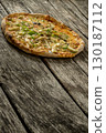 Delicious freshly oven baked pizza 130187112