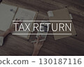 Tax return text over the image 130187116