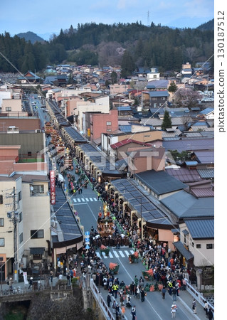 Takayama City, Gifu Prefecture, Japan: Spring Takayama Festival Night Festival: Lantern floats parading after sunset: Aerial view of the street Takayama City, Gifu Prefecture, Japan: Spring Takayama Festival Night Festival: Lantern floats parading after sunset: Aerial view of the street 130187512