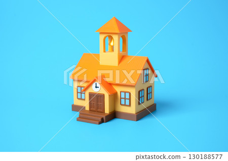 School building with a bell and clock on the facade. Education system, private school, public school, learning environment, children's studies, teaching and knowledge School building with a bell and clock on the facade. Education system, private school, public school, learning environment, children's studies, teaching and knowledge 130188577