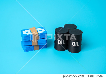 Money and oil barrels. Payment for energy resources, crude oil trade, export revenue, oil sales profit, fuel market, energy business, global commodity transactions Money and oil barrels. Payment for energy resources, crude oil trade, export revenue, oil sales profit, fuel market, energy business, global commodity transactions 130188582