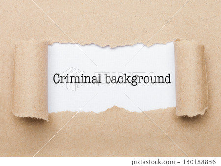 Criminal Background  text behind brown paper 130188836