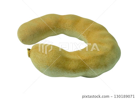 A large brown tamarind fruit, a sour tasting fruit used for cooking or eating fresh and rich in beneficial vitamins and minerals. 130189071