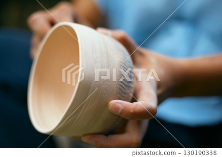 The process of creating pottery.  130190338