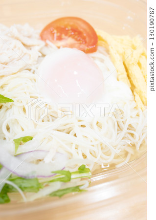 A taste of summer: Delicious convenience store somen noodles topped with a soft-boiled egg 130190787