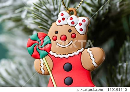 gingerbread man on christmas tree 130191340