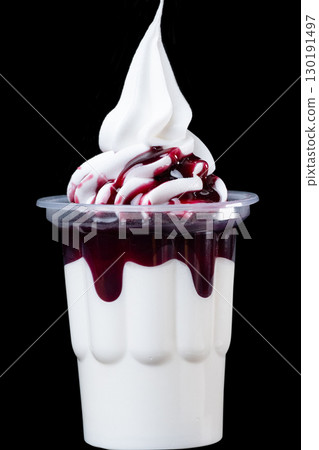 ice cream in cups with fruit syrup isolated 130191497