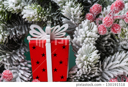 christmas decoration with fir branches and gift 130191518