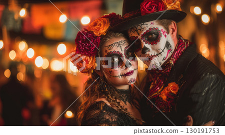 Couple celebrating Day of the Dead with traditional attire and elaborate calavera makeup in Mexico Couple celebrating Day of the Dead with traditional attire and elaborate calavera makeup in Mexico 130191753