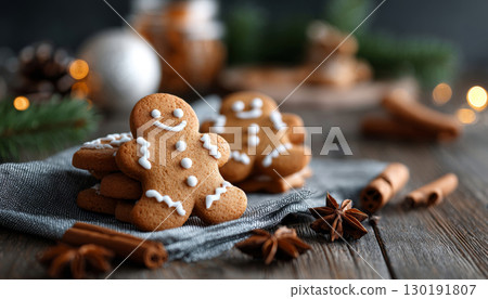 Gingerbread man cookies with cinnamon and festive decorations for a cozy Christmas celebration 130191807