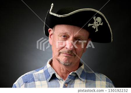Closeup portrait of  senior with a pirate hat 130192232
