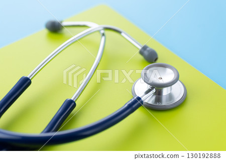 Blue stethoscope and binder 130192888
