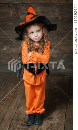 Child in witch costume for Halloween Child in witch costume for Halloween 130192944
