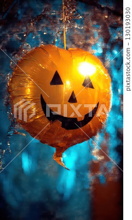 Festive Halloween balloon with cheerful expression 130193030