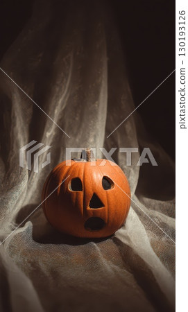 Glowing carved pumpkin for Halloween 130193126