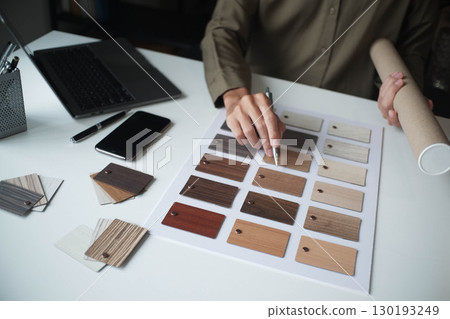 Architecture and Interior Designer man choosing interior materials. 130193249