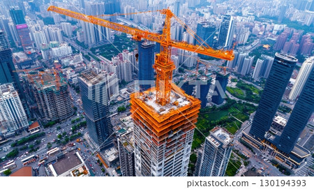 Urban construction boom skyscraper rise. 130194393