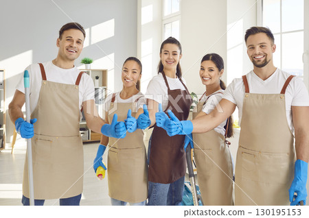 Happy Cleaning Staff Portrait With Thumbs Up In Home Or Office 130195153