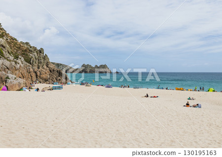 Porthcurno Beach, Cornwall. Golden sand, turquoise sea and granite cliffs Porthcurno Beach, Cornwall. Golden sand, turquoise sea and granite cliffs 130195163
