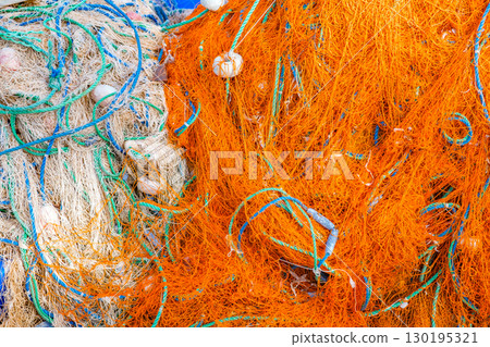 fishing nets with rigging in bulk close-up 130195321
