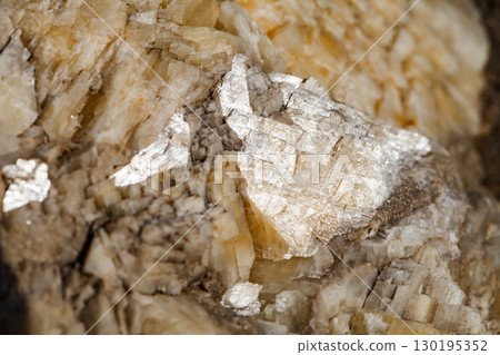 spar stones layers in rock, close-up, selective focus 130195352