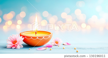 Oil lamp with flowers and bokeh on blue background 130196011