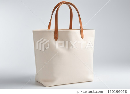 Beige eco shopper bag on white isolated background Beige eco shopper bag on white isolated background 130196058