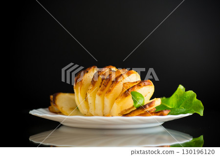 A hearty dish - potatoes from the oven with lard 130196120