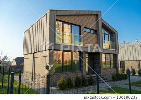 A modern townhouse with a private garden, 130196232