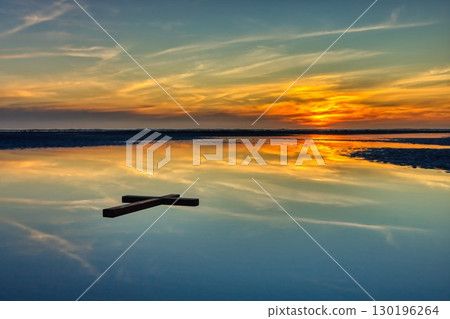 Reflection Sunset of Salvation Cross 130196264