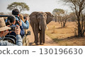 Tourists Observing an Elephant on Safari - Ai Generated 130196630