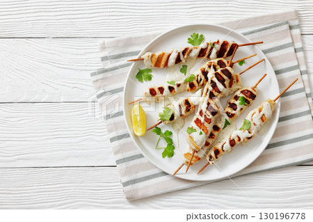 Greek style grilled chicken souvlaki on a plate 130196778