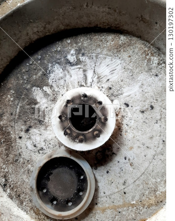 Aerator Diffuser Showing Wear and Residue on a Metal Base After Prolonged Use in Outdoor Conditions Aerator Diffuser Showing Wear and Residue on a Metal Base After Prolonged Use in Outdoor Conditions 130197302