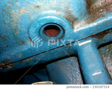 Compression Head Housing Detail Showing Wear and Tear in Mechanical Assembly Area 130197314