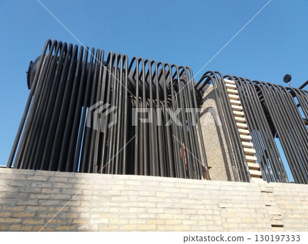 Steam Boiler Installation Showcasing Complex Piping and Design in Industrial Setting 130197333