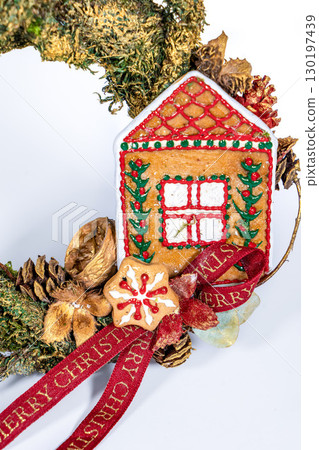 Christmas wreath candle candle gingerbread tree white snow isolated 130197439