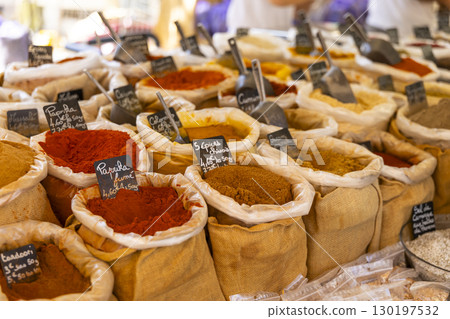Colorful spices for sale at the market in Nyons, France 130197532