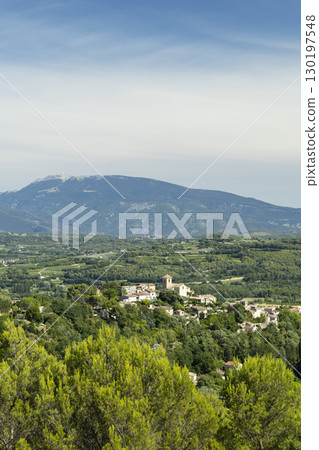 Vinsobres village nestled in the Drome Valley with Mont Ventoux dominating the landscape Vinsobres village nestled in the Drome Valley with Mont Ventoux dominating the landscape 130197548