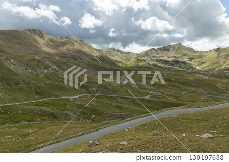Winding road climbing the Bonette Restefond Pass in the French Alps 130197688