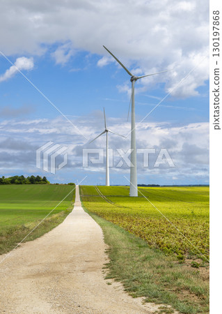 Wind turbines generating clean energy in the countryside of Saron sur Aube, France 130197868