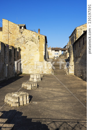 Ruins of Cluny Abbey showing the bases of the columns and the staircase leading to Place de l'Abbaye in Cluny, France Ruins of Cluny Abbey showing the bases of the columns and the staircase leading to Place de l'Abbaye in Cluny, France 130197891