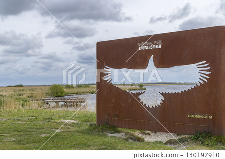 Entrance sign of national park lauwersmeer featuring white tailed eagle 130197910
