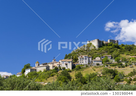 Trigance village with its castle dominating the landscape in Provence, France Trigance village with its castle dominating the landscape in Provence, France 130198044