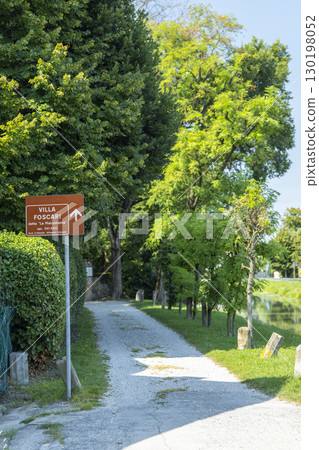 Brown Tourist Sign Showing Path to Villa Foscari in Mira, Veneto Brown Tourist Sign Showing Path to Villa Foscari in Mira, Veneto 130198052